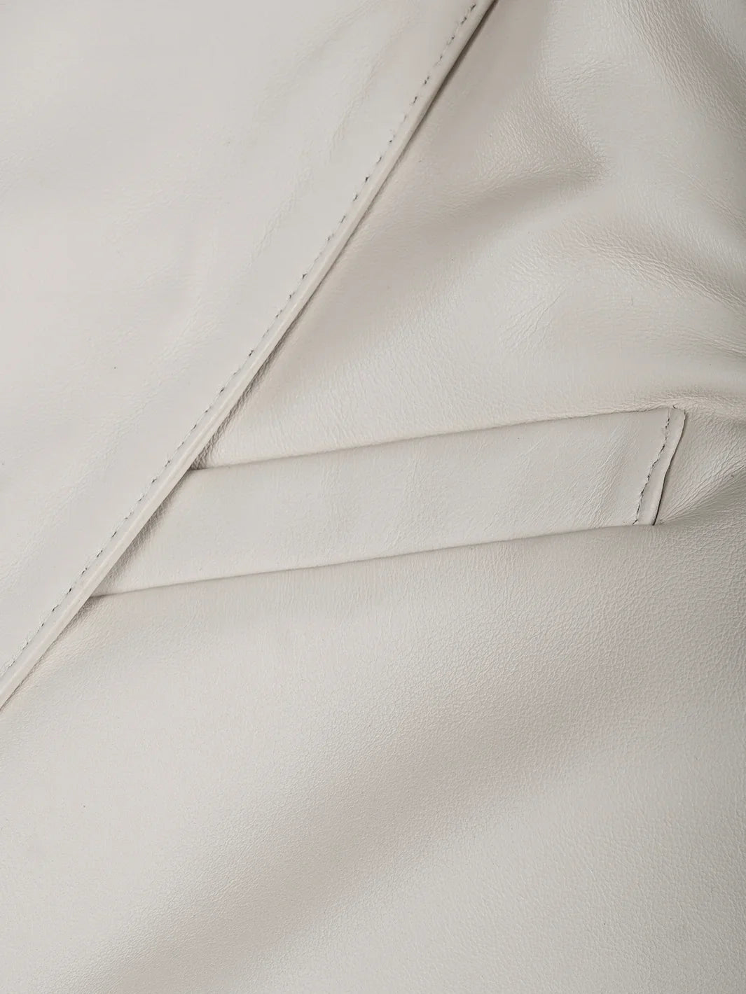 Duke white leather blazer, two-button close-up detail