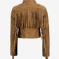 Back of Cassidy women's tan cropped suede jacket with fringe across the shoulders and sleeves