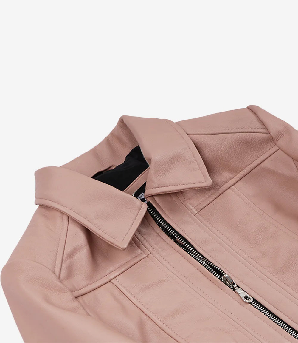 Close-up of Cora blush pink leather jacket's pointed collar, front zip and panel stitching