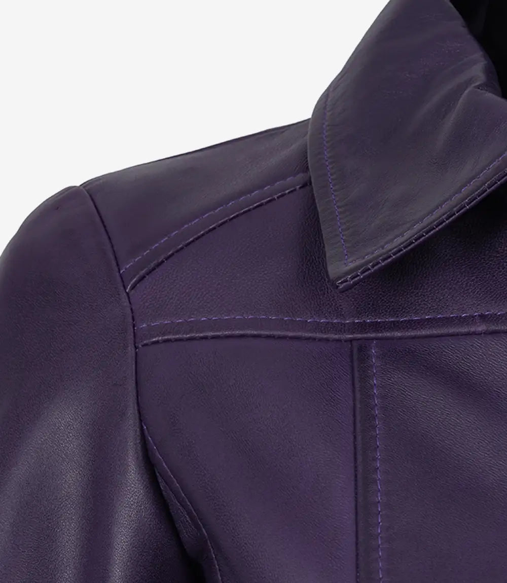 Close-up of shoulder panel stitching and leather texture on Cora women's purple jacket