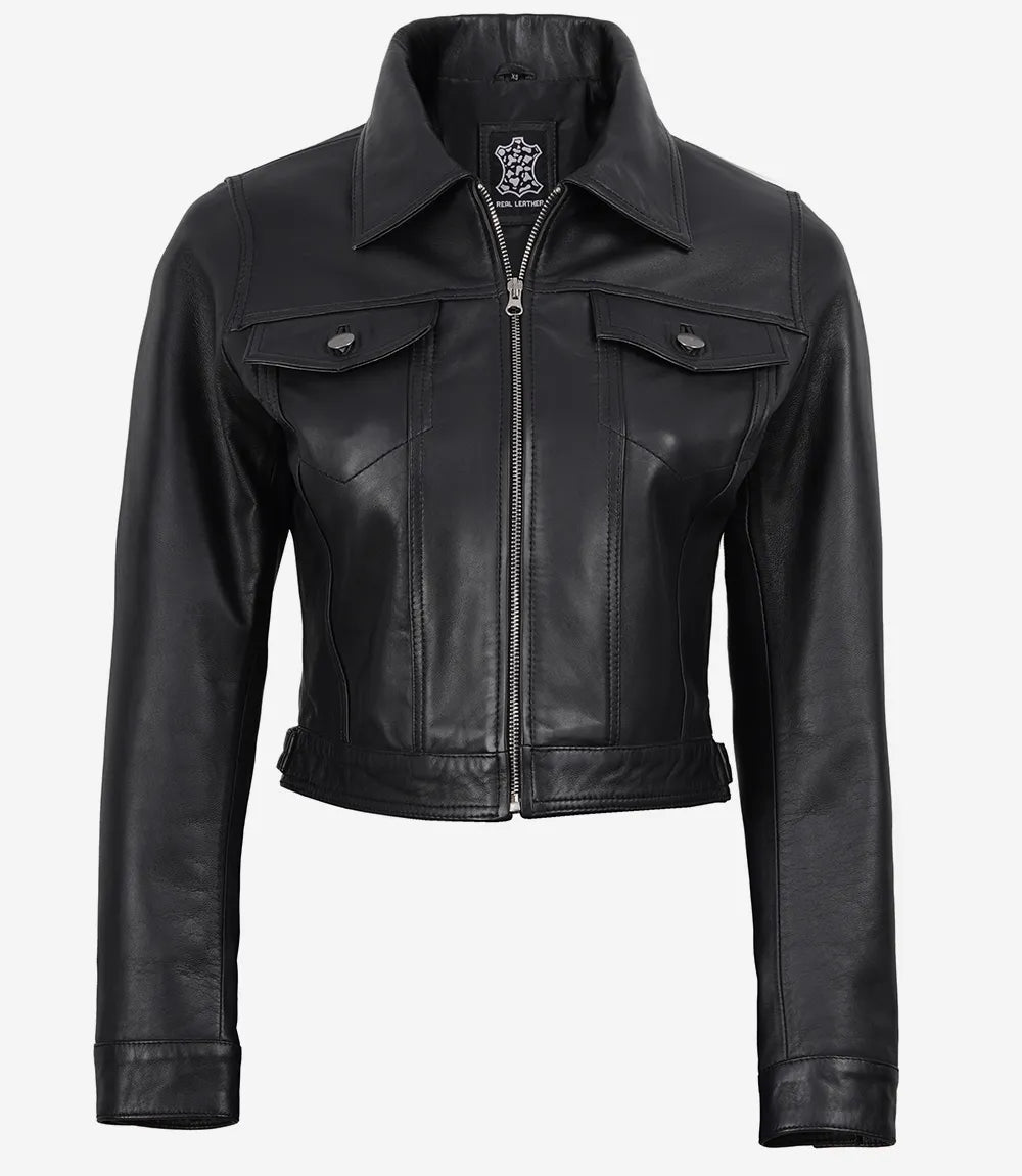 Zipped front view of Elara women's black cropped leather trucker jacket with a pointed collar and chest pockets