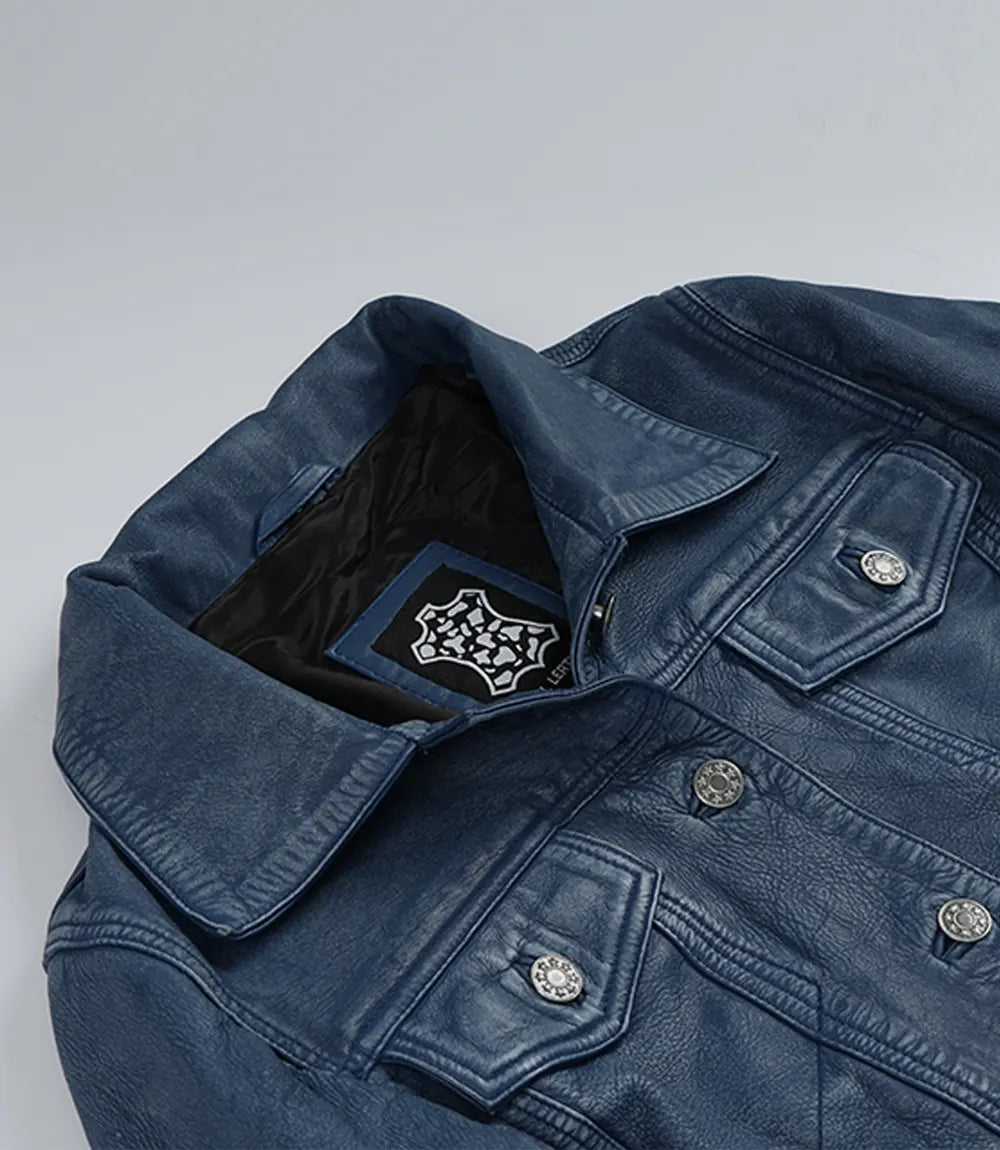 Women's blue washed leather trucker jacket, full front view