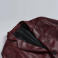 Men's maroon leather blazer, notch lapel closeup detail