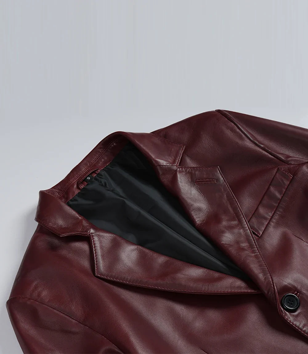 Men's maroon leather blazer, notch lapel closeup detail