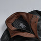 Men's black leather jacket, brown collar lining detail