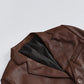 Men's brown leather blazer, notch lapel closeup detail