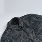 Men's washed leather jacket close-up, texture detail