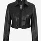 Front view of Mila women's black cropped leather trucker jacket worn open with a pointed collar and chest pockets