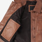 Inside view of Mila brown leather jacket showing the black lining and leather-trimmed inner pocket