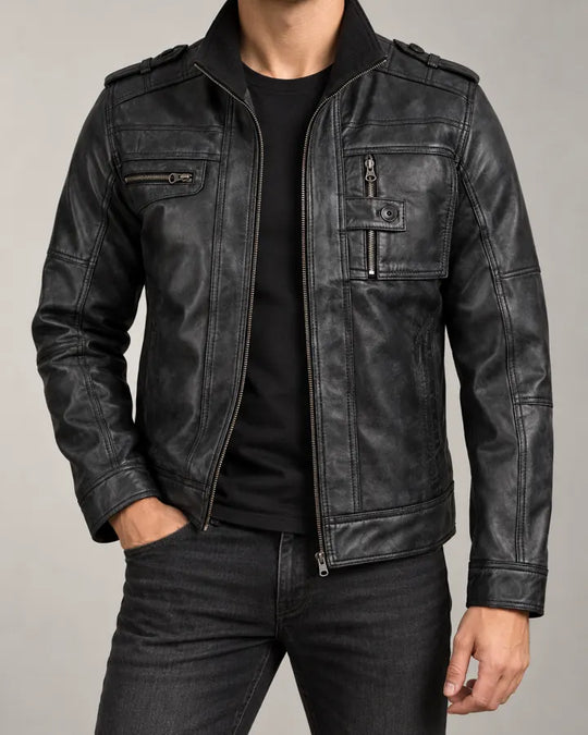 NSM black distressed biker jacket styled on a model, face outside frame