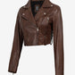 Rhea women's brown cropped leather biker jacket, angled front view showing zipped pocket and waist tab