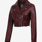 Rhea women's burgundy cropped leather biker jacket, angled front view showing zipped pocket and waist tab