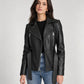 Vesper women's black leather biker jacket worn open over a black top