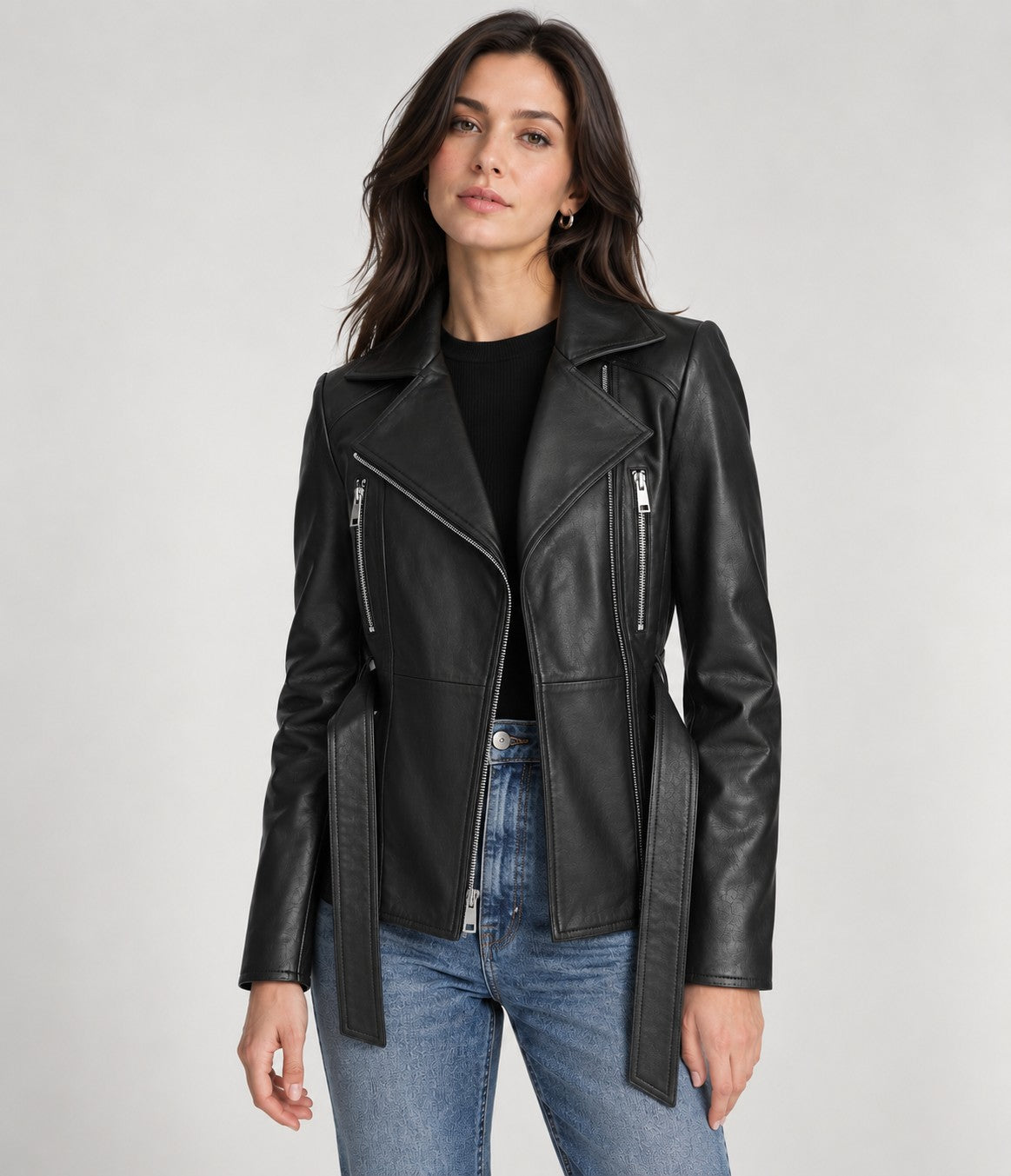 Vesper women's black leather biker jacket worn open over a black top