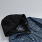Close-up of washed blue genuine leather texture on Betty jacket