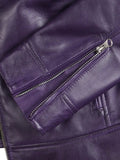 Detail Close-Up – Zippers and Stitching on Purple Leather Jacket.