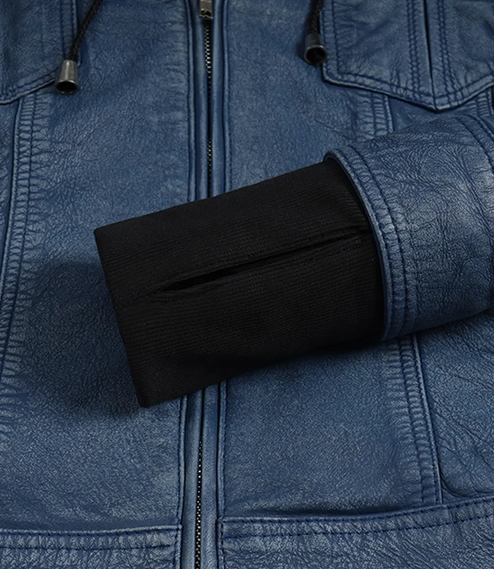 Women's blue leather jacket features, chest pockets and zip hardware detail